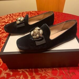 Gucci Black Velvet Loafers with Gold Embellishments